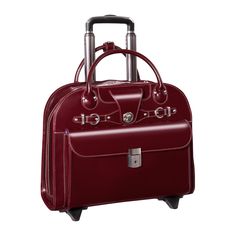 a red suitcase with wheels and handles on the bottom half is shown in front of a white background