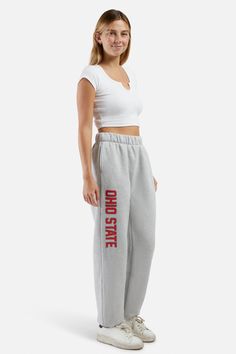 The Basic Sweats! Stay comfy all season long in our best-selling fleece sweatpants. Features front side slash pockets and an elastic waistband. SIZING AND DETAILS Sizing: XS-XXL Elastic waistband Side Pockets 85% Polyester, 15% Cotton Screenprint, Heat Transfer Vinyl Logo application Our sizing is based on women's measurements. When ordering for men, we recommend to size up! Men should select 2 sizes bigger than their normal size. P.S. We’d love to see you repping this style! Make sure to tag us Casual Fleece Joggers With Letter Print, Leisure Fleece Sweatpants With Letter Print, Cotton Sweatpants With Letter Print, Leisure Fleece Bottoms With Letter Print, Casual Full Length Sweatpants With Letter Print, Basic Sweats, Ohio State Apparel, Gameday Outfits, Vinyl Logo