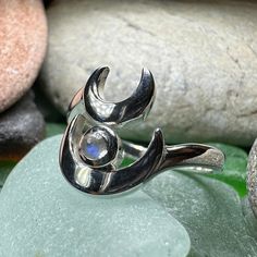 TAKE AN ADDITIONAL 20% OFF THE ALREADY REDUCED SALE PRICE - ADDITIONAL 20% IS DEDUCTED AT CHECKOUT with code SAVE20 A unique design of a double mystical crescent moon accented with bright authentic gemstone of your choice - a delicate and feminine ring in solid sterling silver. Ring face is approximately 1/2" x 1/2" Sizes 5-10 - open ring design allows for size flexibility and comfort! Spiritual Moonstone Ring With Sun And Moon Design, Spiritual Crescent Moon Charm Ring, Spiritual Adjustable Moon-shaped Moonstone Ring, Symbolic Crescent Moon Phase Rings, Silver Crescent Moonstone Ring In Celestial Style, Spiritual Crescent Moonstone Ring With Moon Phase, Mystical Crescent Rings With Sun And Moon Design, Spiritual Crescent Moonstone Ring, Silver Crescent Moonstone Ring With Moon Phase