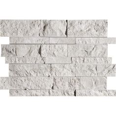 a white brick wall that is made out of stone