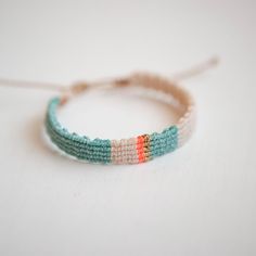 Holland Woven Bracelet Ready-Made Colors- light taupe, mint mist, neon coral,metallic gold Adjustable and Waterproof *ALL ORDER COME WITH A FREE STRAND BRACELET* Adjustable Pastel Beaded Bracelet, Handmade Pastel Bohemian Bracelets, Handmade Adjustable Friendship Bracelets In Pastel, Trendy Adjustable Pastel Friendship Bracelets, Adjustable Pastel Beaded Bracelets For Friendship, Trendy Adjustable Pastel Bracelets, Adjustable Pastel Beaded Bracelets For Everyday, Pastel Beaded Bracelets For Everyday, Trendy Adjustable Pastel Jewelry