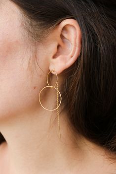 From the Concentric collection, hand formed circles link magically to form organic hoops that move with a carefree weightlessness. The minimalist in you will fall in love with these insanely comfortable threaders. Feather-light chains thread through your ears for a modern look. Perfect for everyday wear. - Sterling silver and vermeil in high polish finish- Oxidized silver in satin finish- Large hoop is 1" wide- Total length is 4-1/2" long Hanging Necklaces, Light Chain, Feather Light, Large Earrings, Oxidized Silver, 18k Rose Gold, Gold Vermeil, Fall In Love, Circles