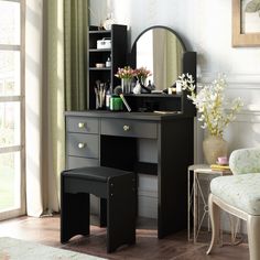 a bedroom with a vanity, stool and mirror