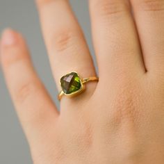 Cushion Cut Peridot Ring - Bezel Ring  - Gemstone Ring- Gold Ring - August Birthstone Ring -. $66.00, via Etsy. Peridot Open Ring Jewelry Gift, Peridot Open Ring Jewelry For Gifts, Peridot Gemstone Stackable Rings As Gift, Green Stackable Crystal Ring As Gift, Green Stackable Crystal Ring For Gift, Green Stackable Crystal Ring Gift, Peridot Birthstone Ring With Bezel Setting As Gift, Green Ring With Bezel Setting, Faceted May Birthstone Ring Jewelry