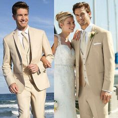 two men and a woman in wedding attire standing next to each other on the beach