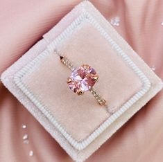 Win it with our Quinn Ring! Now in blue topaz, alexandrite and morganite spinel!  This Breathtakingly beautiful soft pink hue will make up your day! This spinel stone offers a wallet friendly alternative to morganite which is seriously a really stone!  This ring is already pretty by itself, but we recommend to pair with or even triple stack this 100% Genuine Moonstone ring with our dainty stacking rings.  Gemstone: Morganite Colored Spinel Size and Shape: 7 x 9mm Oval Complementary Stones: White Oval Morganite Jewelry For Proposal, Morganite Diamond Ring With Center Stone As Gift, Morganite Ring For Proposal, Gift Morganite Diamond Ring With Center Stone, Morganite Ring Jewelry For Proposal, Morganite Ring With Round Cut For Gifts, Morganite Ring With Prong Setting For Proposal, Morganite Ring With Halo Setting As Gift, Morganite Rings With Prong Setting For Proposal