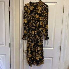 Summer Dress Black A-line Maxi Dress For Brunch, Formal Black Midi Dress With Floral Print, Black Floral Print Dress For Work, Black Maxi Dress For Brunch In Fall, Black A-line Midi Dress For Brunch, Navy And Gold Dress, Gold Floral Dress, Pink A Line Dress, Metallic Knit Dress