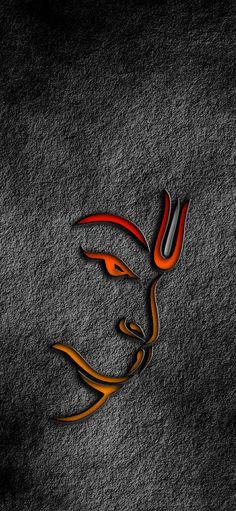 an orange and black logo on a gray background with the word's name in arabic