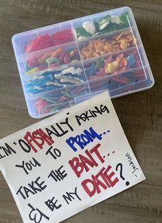 two plastic containers filled with assorted candies and a sign that says can't opally bring you to prom take the bat do my date?