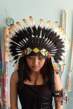 White Orange & Black Feather Indian Headdress This Headdress is 100% handmade from feathers. * Head circumference: 59 centimeters / 23 inches * Length : Short * Beads color and pattern may vary each headdress WHY US? * 100% Handmade and Eco Friendly Product * Finest Quality - Each item will go through a Quality Control process before shipping. * No Markup Price * Every purchase supports Balinese Artisans - All Artisans will keep on following their passions while providing for their families. Adjustable Black Feather Headpiece, Black Hat For Carnival, Adjustable Black Feathered Headpiece, Adjustable Black Headpieces For Festival, Traditional Black Hat For Festival, Traditional Black Festival Hat, Black Headpiece For Carnival Festival, Black Headpieces For Carnival Festival, Black Halloween Festival Hat Bands