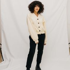 The Lou Cardigan is in a neutral shade of beige. It’s made from a decadent cozy cotton blend featuring ribbed surface texture throughout. This style is finished with novelty honey brown buttons at the center front for an elevated look.  Runs Small to size, size up for a looser fit. Closes at front with contrasting buttons. Main fabric: 50% Cotton, 50% Polyester Slightly stretchy fabric Dry Clean Cream Cotton Button-up Cardigan, Beige Wool Cardigan With Ribbed Cuffs For Work, Beige Cotton Cardigan With Button Closure, Button-up Beige Cotton Cardigan, Beige Cardigan With Button Cuffs For Fall, Beige Cardigan With Ribbed Cuffs For Work, Cream Cotton Cardigan For Work, Cream Cotton Cardigan With Ribbed Cuffs, Beige Relaxed Fit Button-up Cardigan