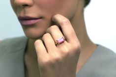 Embrace the unique charm of our Rose Gold Rhodonite Ring, featuring a beautifully cut rectangle stone that exudes sophistication. The soft pink hue of the rhodonite set in rose gold creates a stunning visual contrast, making this ring a standout piece. Perfect for those who appreciate the beauty of semiprecious stones, its stackable design offers versatility for various styles. Whether worn alone or combined with other pieces, this solitaire ring is an essential addition to any jewelry collectio Rectangle Stone Ring, Rhodonite Ring, Ring Rectangle, Fancy Gifts, Unique Handmade Jewelry, Pink Ring, White Ring, Unique Charms, Jewelry Lover