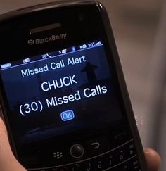 a cell phone displaying the missed call alert