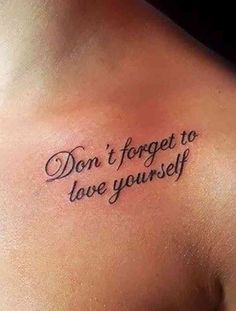 a woman's chest with a tattoo saying don't forget to love yourself