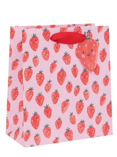 a pink shopping bag with strawberries on it