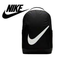 Add Some Serious Swag To Your School Day With This Nike Brasilia Black/White Backpack. Made With A Polyester Shell Containing At Least 50% Recycled Polyester Fibers, This Backpack Has A Spacious Main Compartment With Two-Way Zip Around Closure. A Large Nike Swoosh Logo At The Front And Shoulder Strap Add Iconic Sporty Vibes. Features Include A Front Zipper Compartment For Quick Access, Top Haul Loop, Side Mesh Pockets Ideal For Water Bottle Storage, And Adjustable Padded Shoulder Straps For A Co Gym Sack, Water Bottle Storage, Nike Backpack, White Backpack, Nike Bags, Nike Swoosh Logo, Nike Classic, Nike Accessories, Bottle Storage