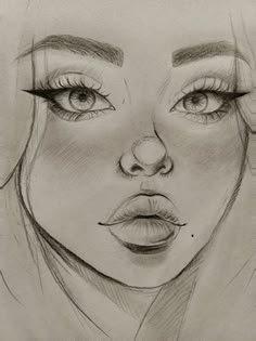 a pencil drawing of a woman's face