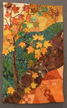 an art piece with leaves on it and a tree in the middle, surrounded by foliage