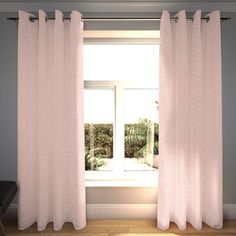 the curtains in this room are pink and have diamond designs on them, while the window is open