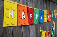 a happy birthday banner made out of lego blocks