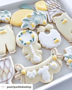 some decorated cookies are on a tray