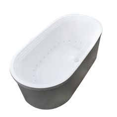 a white bath tub sitting on top of a counter