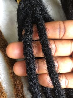 About this item- Quantity: 10 Locs/bundle- Color: Natural Black, (can be dyed to various colors)- Length: 4”-24” (Inches)- Size: 0.4cm-1cm- Style: Straight tips- Material: Afro Kinky Human Hair Our Custom 100% Human Hair Dreadlock Extensions are strong, realistic looking and affordable. We customize each Dread Extension to your needs. These permanent locs are made for men and women using the crochet dreadlocks method. Loc Extensions Permanent Human Hair, Artificial Locs, Starter Dreadlocks, Loc Extensions Permanent, Extension Dreadlocks, Small Dreads, Dread Hairstyles For Men, Hair Dreadlocks, Dreadlocks Extensions