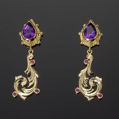 These exquisite 18K Treasure Gold earrings are a stunning fusion of beauty and craftsmanship. Featuring mesmerizing pear-cut amethysts surrounded by intricate gold granulation, delicately hand-carved vines with ruby 'berries', and imbued with actual shipwreck treasure, these earrings radiate an air of sophistication and luxury. Indulge in these lavish earrings, whose elegant designs and intricate craftsmanship will add a touch of tasteful opulence to your look. . Handcrafted in 18K Treasure Gold Treasure Gold, Vine Earrings, Jewelry Words, 18k Gold Jewelry, Ruby Earrings, Colored Gems, Shipwreck, Amethyst Earrings, Hand Engraving