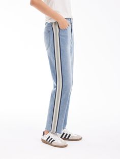 Details: Tapered jeans with striped webbing in clashing coloursStriped webbing on the side adds a retro vibe and creates a casual, sporty look.Tapered silhouetteRaw edges on the legs Materials & Care: Cotton 93.8% Polyester fibre 5.8% Spandex 0.4% Hand wash | Dry clean Do not bleach Size & Fit: Model is 5'7", Bust 32, Waist 24, Hips 35, wearing a size S Item #: SN2DP16 Casual Streetwear Bottoms With Signature Stripes, Casual Bottoms With Signature Stripes For Streetwear, Sporty High-rise Cotton Jeans, Sporty Mid-rise Jeans, Casual Straight Leg Bottoms With Contrast Stripes, Sporty Straight Leg Denim Jeans, Sporty Mid-rise Cotton Jeans, Sporty High Rise Jeans For Spring, Sporty Blue Straight Leg Jeans