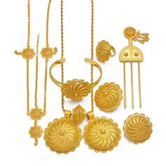 PRICES MAY VARY. Elegant Ethiopian Gold Jewelry Set: Elevate your style with our exquisite jewelry set 6pcs, featuring a necklace pendant, earrings, hair chain, hairpin and adjustable ring, bangle for a perfect fit (Necklace Length 45cm/17.7inches) Quality Craftsmanship: Made from hypoallergenic zinc alloy with a luxurious gold plating, our jewelry sets are lightweight and comfortable for all-day wear Versatile and Stylish: Whether for weddings, parties, or everyday wear, our Ethiopian jewelry s Wedding Ornaments, Ethiopian Jewelry, Hair Chain, African Traditional Wedding, Hair Chains, Pendant Ring, Gold Jewelry Sets, Wedding Ornament, Earrings Ring