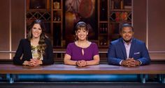 three people are sitting at a table on the set of tv show good morning america