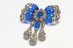 Vintage Hattie Carnegie Brooch.Extremely Rare 1950’s Hattie Carnegie crystal brooch in very good condition. Collectors item! Approximate Measurements: Length 3.3”, Width 4”. Made in USA. Blue Crystal Beads, Hattie Carnegie, Beautiful Bracelets, Vintage Eclectic, Large Bow, Crystal Brooch, Blue Crystals, Vintage Brooches, Vintage Watches