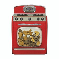 a red stove top oven sitting next to a pile of cut up dog treats in front of it