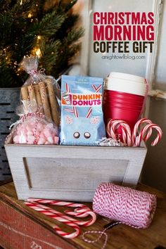 christmas morning coffee gift in a wooden crate with candy canes, hot chocolate and marshmallows