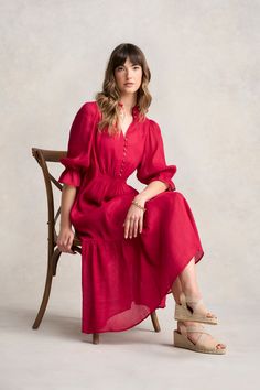 Taking inspiration from vintage dresses, the festive Linen Silk Tier Dress is a showstopping piece of our new Tropical Tambour collection. In romantic Rouge, this flattering maxi-length dress is crafted from luxurious linen silk, offering a soft hand-feel and comes complete with a matching, adjustable slip. It boasts jewelled ruby buttons for a hint of glint and can be worn open at the collar for a more casual look or buttoned up for formal occasions. Tier Dress, Spring Wear, Capsule Outfits, Work Wear Women, Luxury Linen, Wearing Clothes, Knitwear Cardigan, Sustainable Clothing, Soft Hand