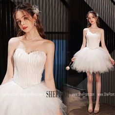 White Strapless Dress For Debutante Ball, White Strapless Corset Dress For Prom, White Tulle Strapless Dress, White Strapless Dress With Sweetheart Neckline For Prom, White Strapless Dress For Prom, White Tulle Strapless Dress For Party, White Strapless Dress For Prom Season, White Strapless Dress For Wedding, White Strapless Corset Dress For Homecoming