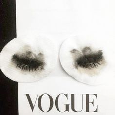 an advertisement with two fake eyelashes on it's side and the words voque written below