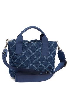 A quilted shopper bag crafted from fabric made from a cotton-and-polyester blend is sure to become a well-loved accessory in your collection. 10.4"W x 8.26"H x 4.5"D; 26.3" strap drop Top zip closure Top carry handle; removable, adjustable crossbody strap Textile Imported Drop Top, Kurt Geiger, Nordstrom Store, Shopper Bag, Crossbody Strap, Nordstrom Rack, Nordstrom, London, Navy