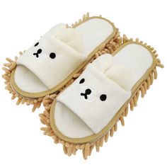 a pair of slippers that have been made to look like teddy bears on them