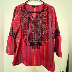 Like New- Never Worn! Fits Like A M/L Or Oversized For A Small Red Fall Tunic Top, Red Tunic Tops For Fall, Red Embroidered Long Sleeve Top For Fall, Casual Red Blouse With Floral Embroidery, Embroidered Long Sleeve Red Top, Red Festive Tunic Blouse, Festive Red Tunic Blouse, Red Embroidered Long Sleeve Tops, Red Tunic Blouse For Festive Occasions