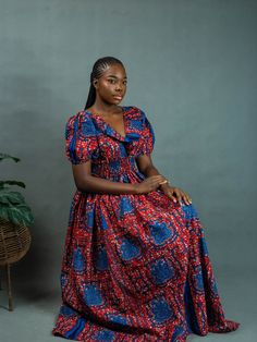 All of Elisamama’s apparel is handmade by a team of artisans in Nigeria. The puff-sleeve Ayo maxi dress is decorated with a ruffle-embellished bodice and mixed paisley prints. Crafted of cotton poplin, the style offers a plunging V-neckline and banded elasticized waist. Plunging V-neck Short puff sleeves, elasticized cuffs Banded elasticized waist Plunging V'd back 100% cotton Wash cold Hang dry or tumble dry low As with all our products, every purchase allows us to continue to further our missi 2piece Outfits, Ankara Gown, Ankara Gown Styles, African Clothes, Gown Styles, African Prints, African Style, African Dress, African Clothing