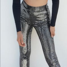 Zara High-Rise Sparkly Leggings Extra Long Color: Sliver Sz: S Glamorous Stretch Leggings For Party, Glamorous Party Leggings With Stretch, Metallic Shiny Stretch Bottoms, Silver Shiny Disco Bottoms, Glamorous Shiny Summer Bottoms, Shiny Silver Disco Bottoms, Disco Silver Shiny Bottoms, Fitted Leggings For Party, Party Sequin Stretch Leggings