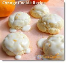 orange cookie recipe with white icing on pink paper