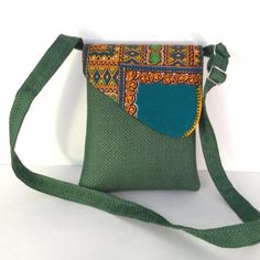 Green Rectangular Flap Bag With Adjustable Strap, Green Mobile Phone Flap Shoulder Bag, Green Shoulder Flap Bag With Mobile Phone Pocket, Eco-friendly Green Pouch Shoulder Bag, Eco-friendly Woven Crossbody Shoulder Bag, Green Square Shoulder Bag With Cell Phone Pocket, Green Flap Shoulder Bag For Daily Use, Green Flap Bag With Removable Pouch, Green Pouch Flap Bag With Removable Pouch