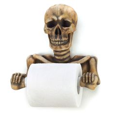 a skeleton holding a roll of toilet paper