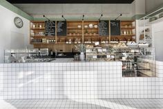 the inside of a restaurant with lots of counter space