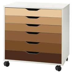 a white and brown dresser with four drawers