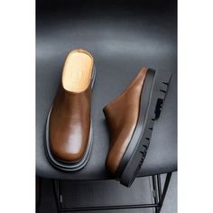 Step into luxury and style with our Opulent LuxeLeather Business Beach Slippers. Crafted with genuine cow leather and pigskin lining, these brogue slippers exude sophistication. The slip-on design and rubber outsole provide comfort and ease, while the 5.5cm heel adds a touch of elegance. Elevate your footwear collection with these opulent slippers today. Experience the epitome of luxury and style with our Opulent LuxeLeather Business Beach Slippers. Crafted with genuine cow leather and pigskin lining, these brogue slippers exude sophistication. Slip into comfort and ease with the slip-on design and rubber outsole, while the 5.5cm heel adds a touch of elegance. Elevate your footwear collection with these opulent slippers today. Indulge in the ultimate luxury and style with our Opulent LuxeL Brown Slip-ons With Textured Sole And Round Toe, Leather Slip-ons With Leather Footbed, Brown Calf Leather Slip-ons With Leather Sole, Leather Slip-ons With Flat Heel And Leather Sole, Leather Slip-ons With Round Toe And Leather Footbed, Leather Slip-ons With Textured Sole, Leather Slip-ons With Textured Sole And Flat Heel, Brown Closed Toe Slip-ons With Rubber Sole, Classic Leather Slip-on Clogs