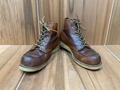 Vintage 70's Red Wing work hunting outdoor boots size 7 E, color brown, rubber sole. Good used condition, some wear, marks, made in U.S.A.  Please, check carefully the measurements, photos and description of the article before buying it, we do not accept changes or returns. Outsole Approximate Dimensions: 11 1/2" long heel to toe. 10" Inside from the heel to the toe. 4" Widest wide in front of footwear. 6" Tall total. Let me know if you have any questions or would like to see additional photos. Moc Toe Work Boots With Vibram Sole For Hunting, Rustic Moc Toe Work Boots With Rubber Sole, Rustic Brown Work Boots With Goodyear Welt, Brown Hunting Work Boots With Round Toe, Rustic Work Boots With Rubber Sole And Moc Toe, Vintage Brown Boots For Outdoor Work, Rustic Brown Work Boots With Goodyear Welt Construction, Rustic Brown Waterproof Moc Toe Boots, Vintage Moc Toe Work Boots With Leather Lining