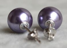 I make the earrings to use about 6mm or 8mm or 10mm lilac glass round pearls and sterling silver post .IT is good earrings for your great wedding,if you need the other colour ,Please let me know. I can make different type earrings to your requirements,Please feel free to contact me if you have any question. Thank you so much. . Matching necklace: https://www.etsy.com/listing/159058373/lilac-pearl-necklacelight-purple-pearl?ref=shop_home_active_1 dangle earrings: https://www.etsy.com/listing/1548 Purple Round Pearl Earrings For Gift, Good Earrings, Earrings Bridesmaid, Purple Pearl, Earrings Round, Earrings Wedding, Pearl Stud Earrings, Matching Necklaces, Bridesmaid Earrings